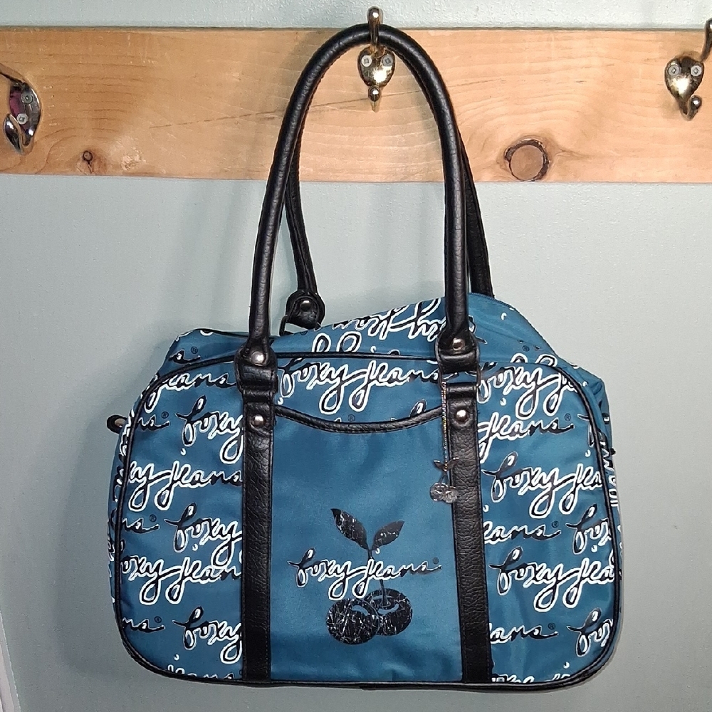 Trendy Blue Foxy Jeans  Shoulder Bag. New With Tags And Padded Shoulder Strap.